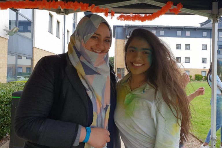 two women, one with headscarf