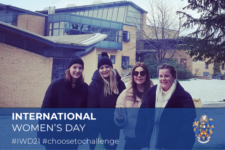 four young white women in front of southlands college